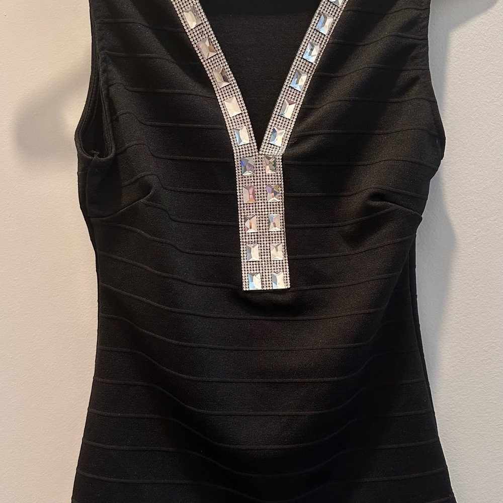 Elegant Black Sleeveless Top with Embellished V-Neck